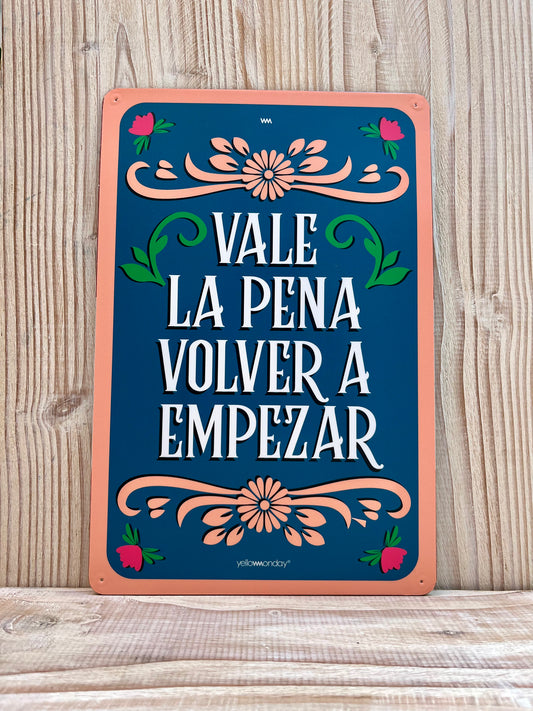 Placa "Vale La Pena"