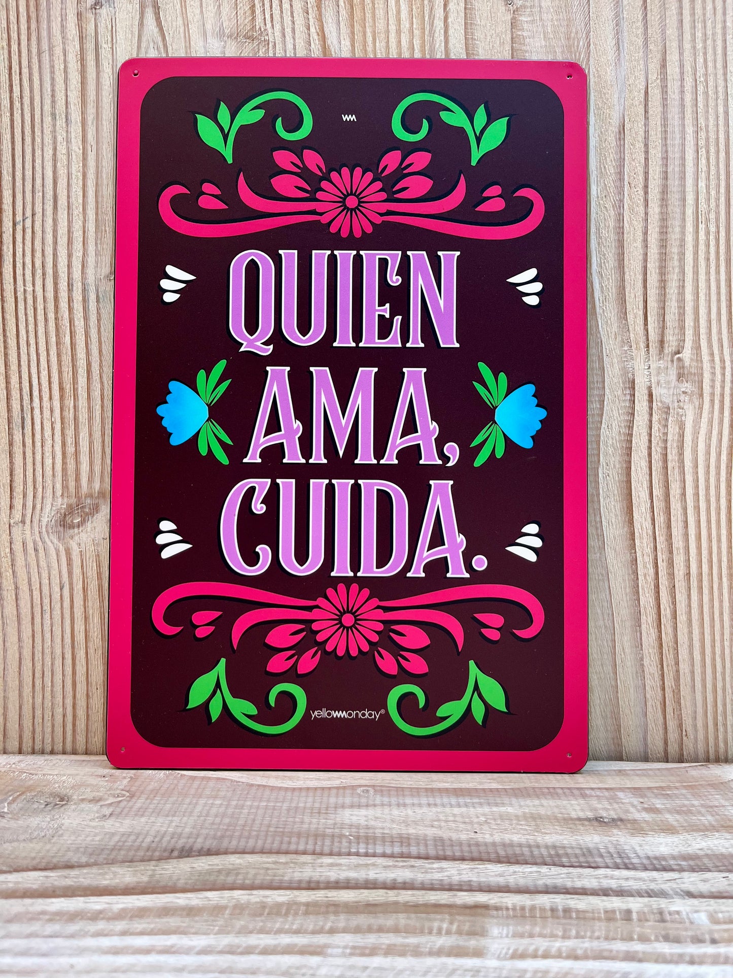 Placa "Quien Ama Cuida"